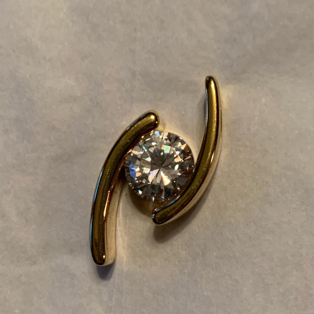 Lia Sophia gold slide.